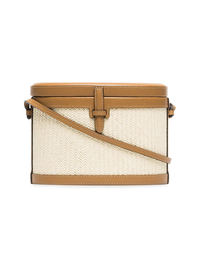 beige and brown trunk woven straw and leather bag