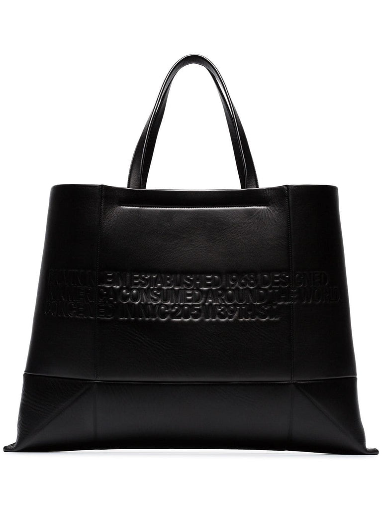 black geometric embossed leather tote