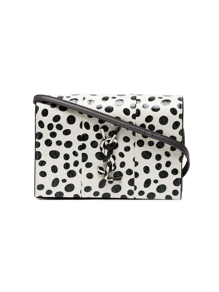 black and white Kate polka dot leather wallet on a chain