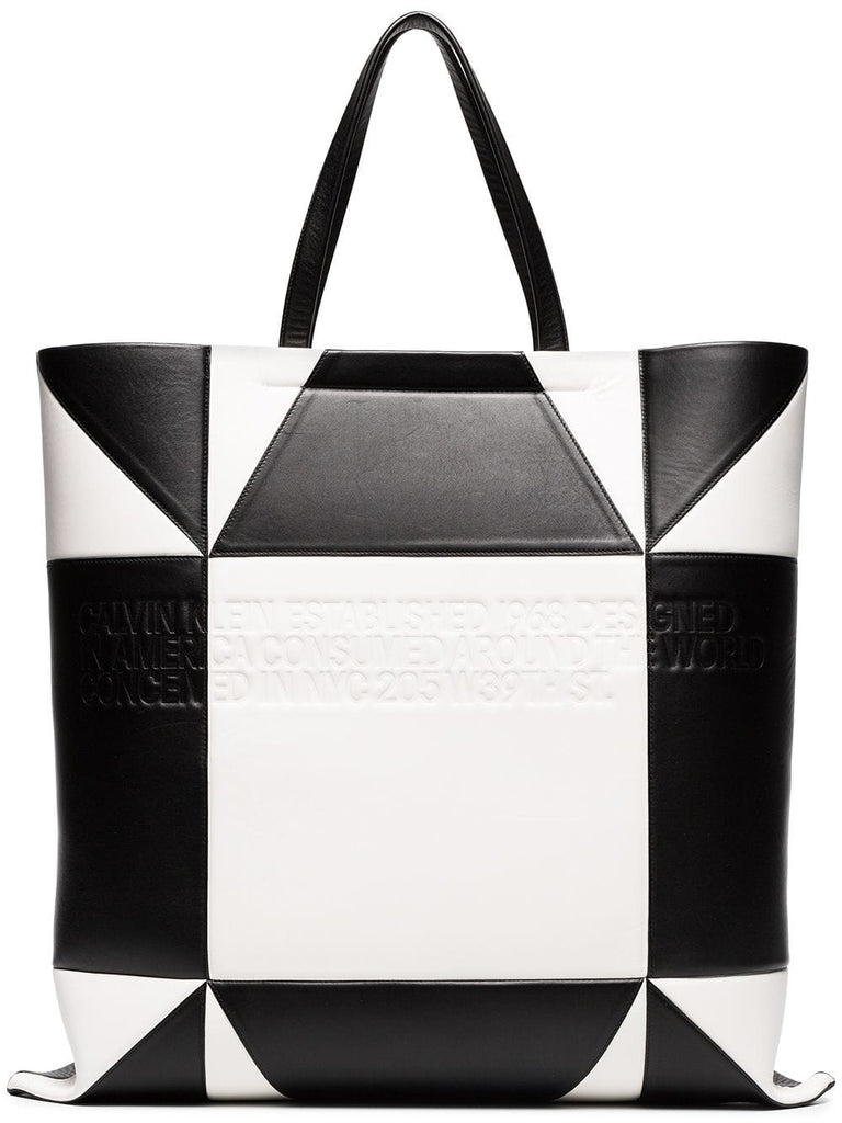 white and black geometric quilted leather tote