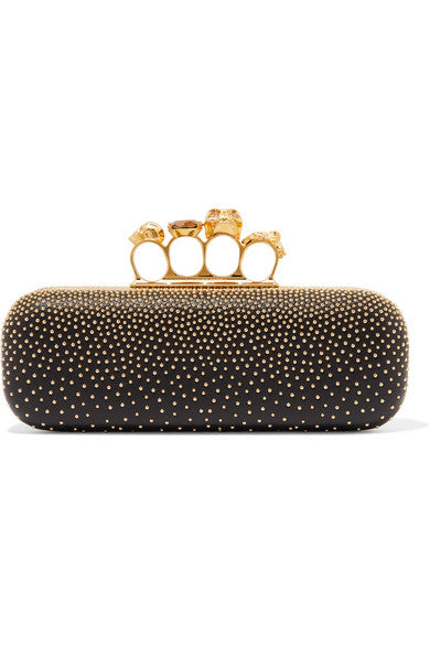 Knuckle embellished leather clutch