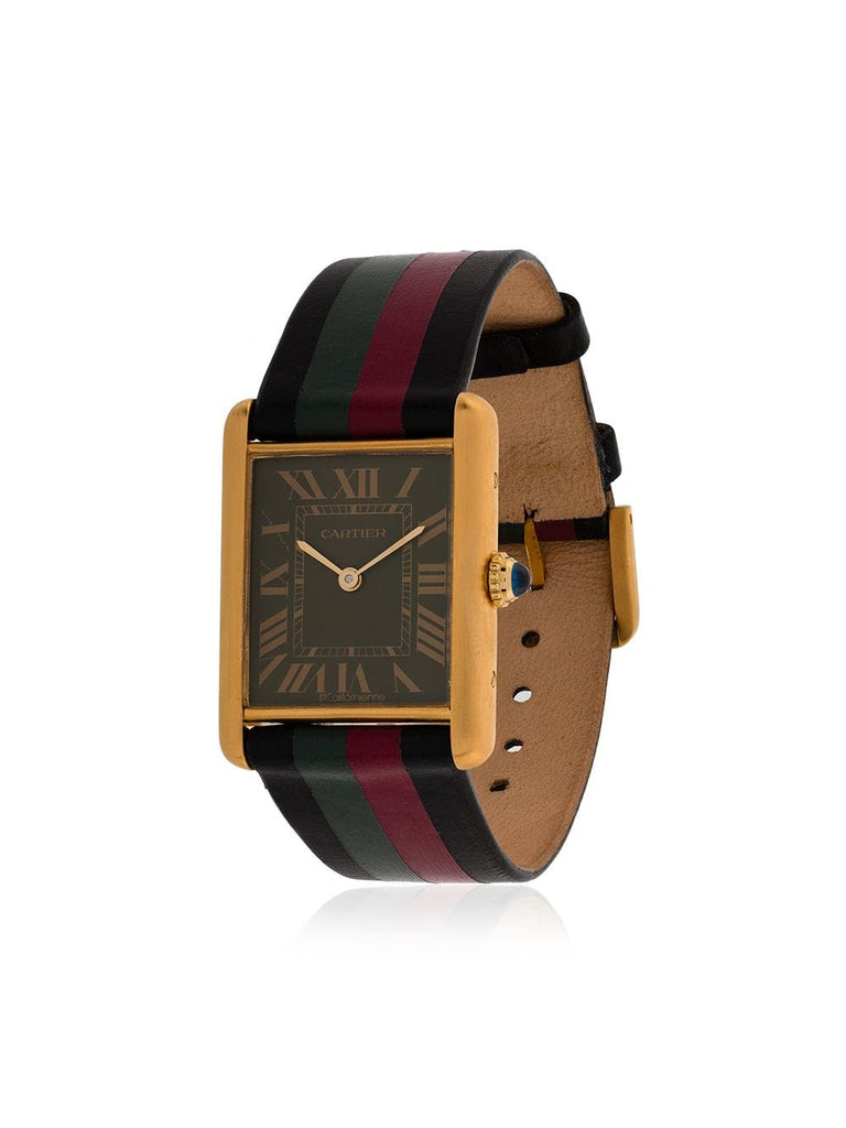 black, red and green cartier tank titan vega watch