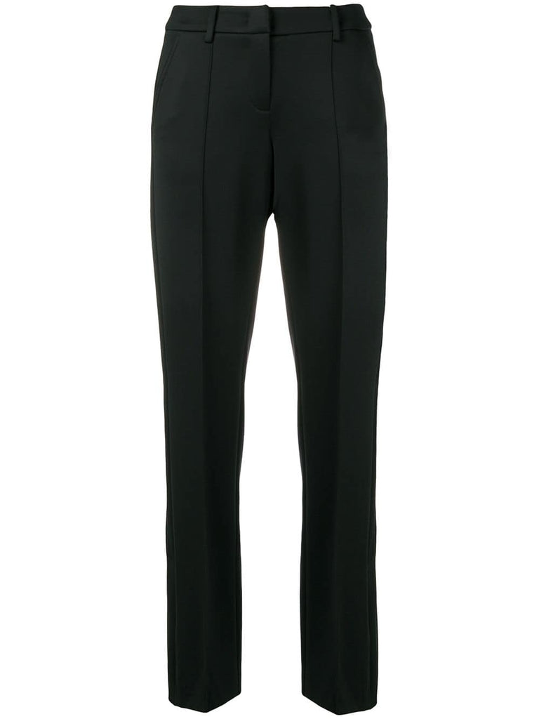 creased slim-fit trousers