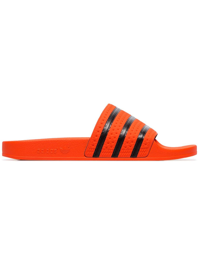 orange Adilette rubber slides