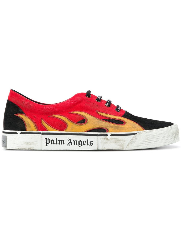 Flame distressed low top sneakers