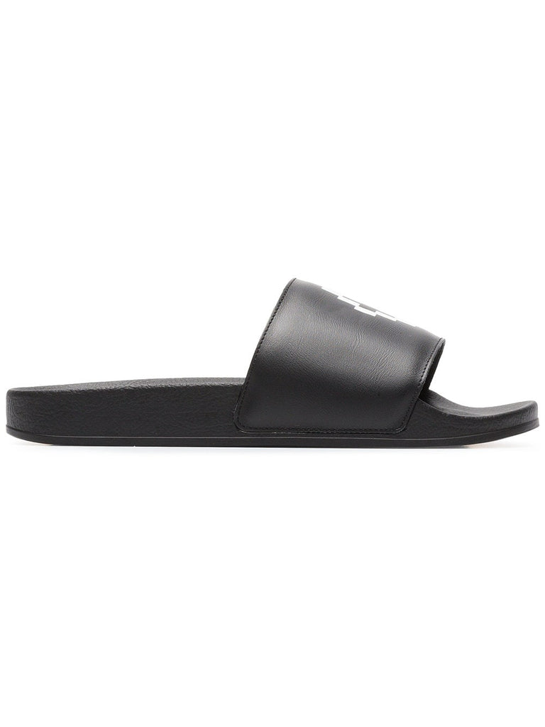 black and white cruz leather slides