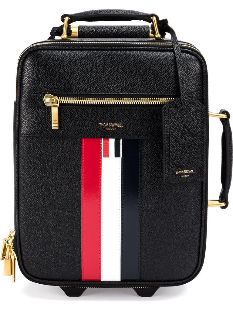 striped luggage bag