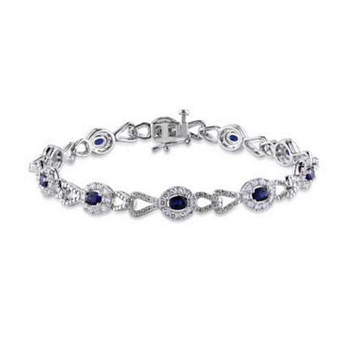 1/10 CT. T.W. Sterling Silver White & Color-Enchanced Blue Diamond Crossover Bracelet